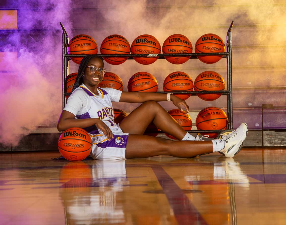 Senior with basketballs